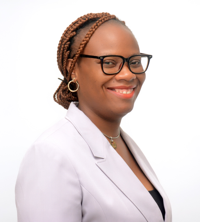 businessman standing outside office building